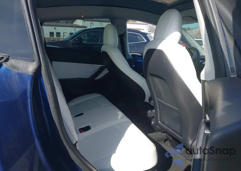 2021 Tesla Model Y Standard Range Rear-Wheel Drive from USA, damaged, VIN 5YJYGDED4MF123082